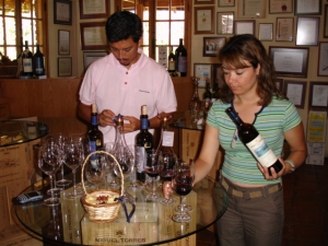 pouring the wines for our tasting at Miguel Torres