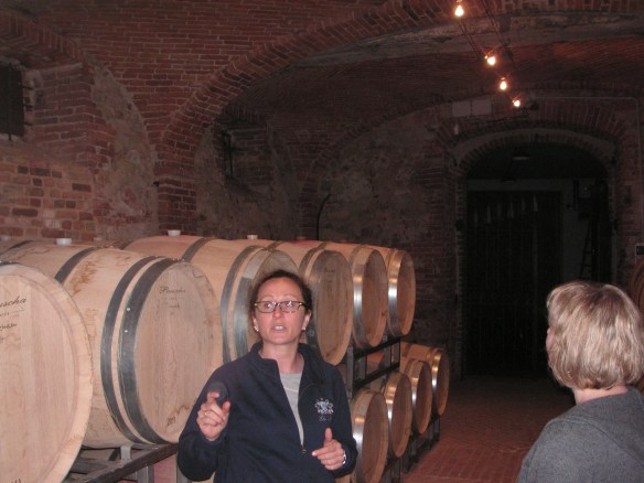 Silvia Altare in the barrel room of Elio Altare